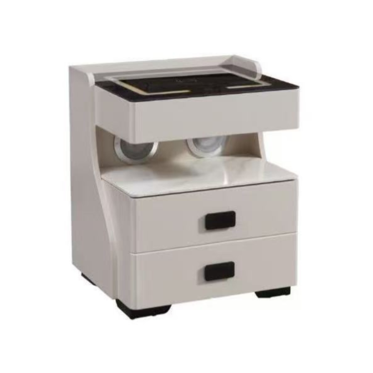 White cabinet with a black top on a white background