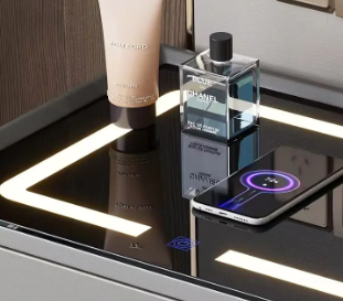 Modern vanity setup with skincare products and a smartphone on a reflective surface.