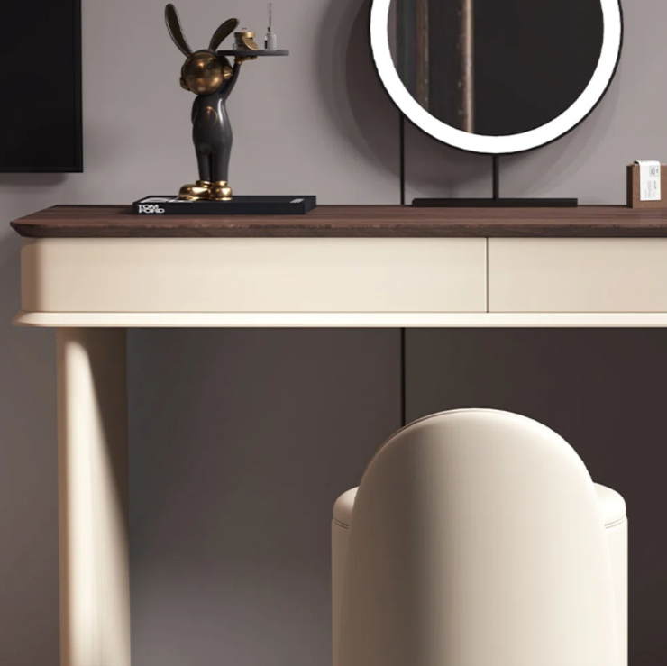 Modern console table with decorative items and a chair in a minimalistic setting