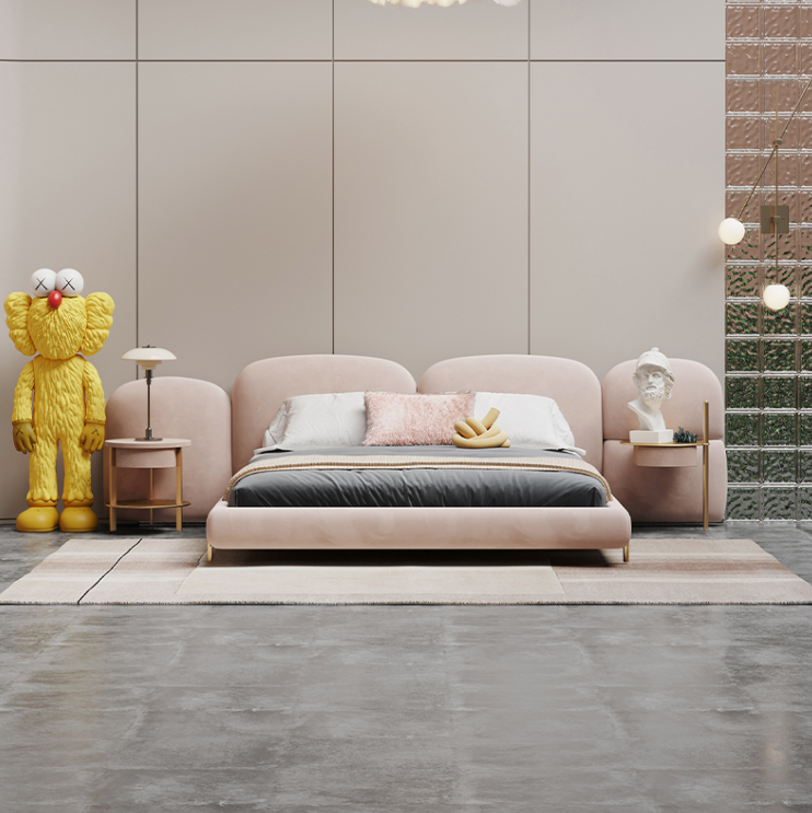 Modern bedroom with a pink bed, nightstands, and decorative items.