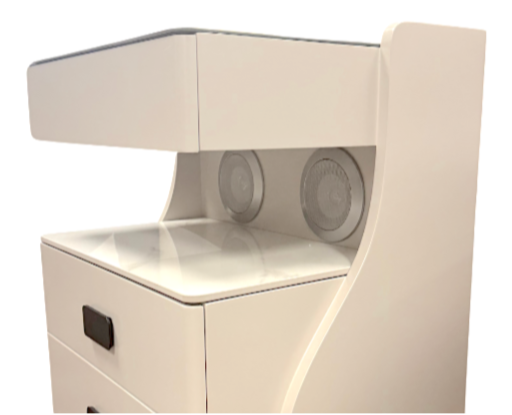 Beige electronic device with two circular components on a white background