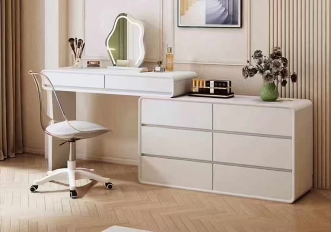 White vanity desk with mirror and chair in a room setting