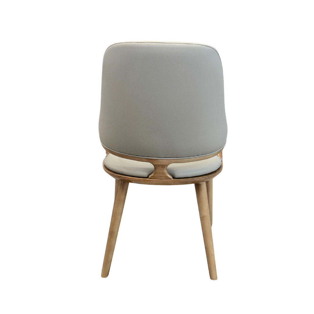 Chair with gray cushioned backrest and wooden legs on a white background