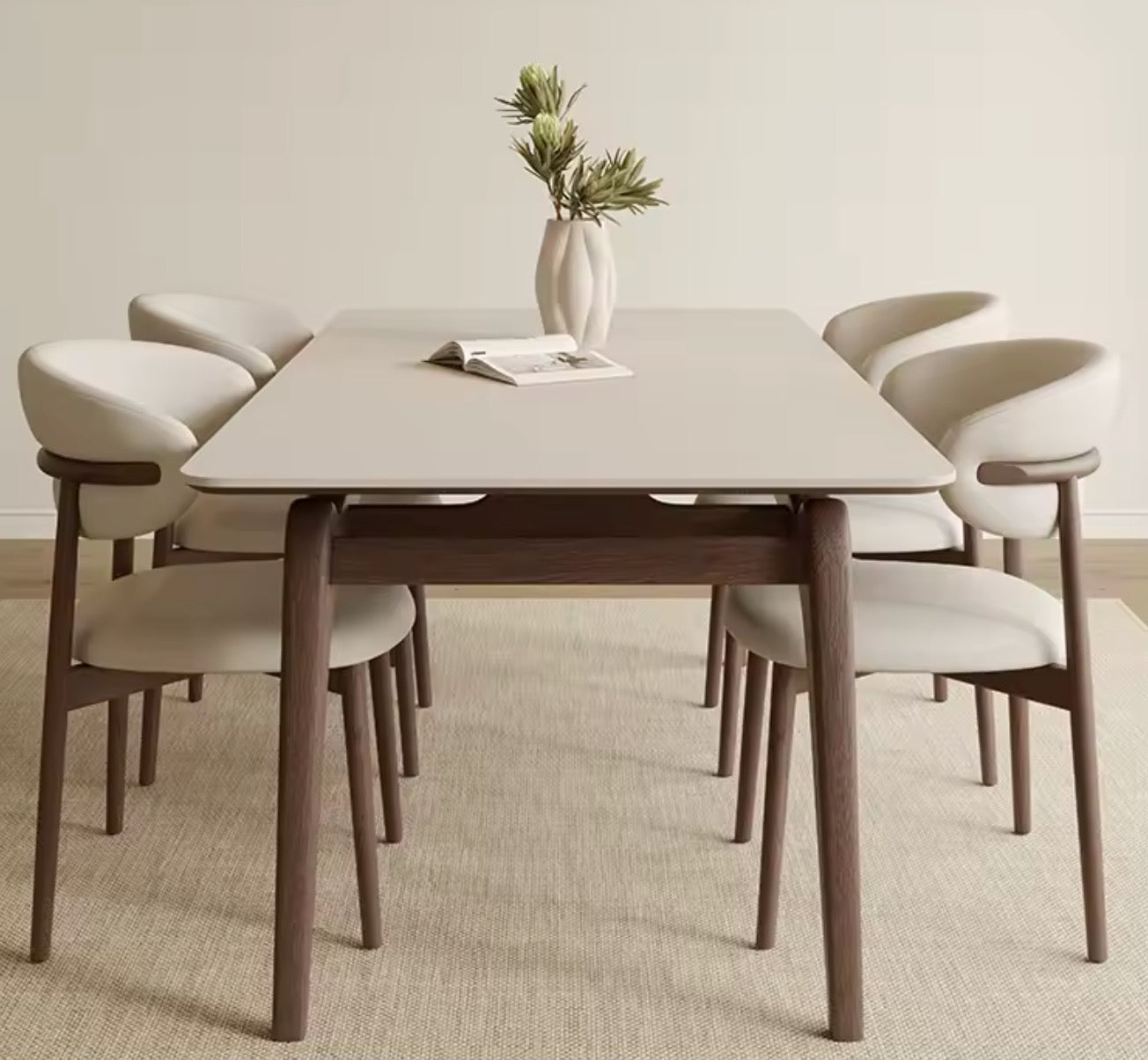 Dining table set with six chairs in a minimalistic room.
