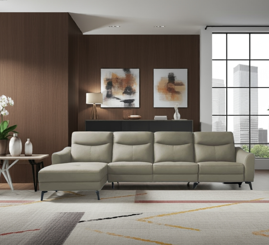 Modern living room with a beige sectional sofa, abstract art, and a large window.