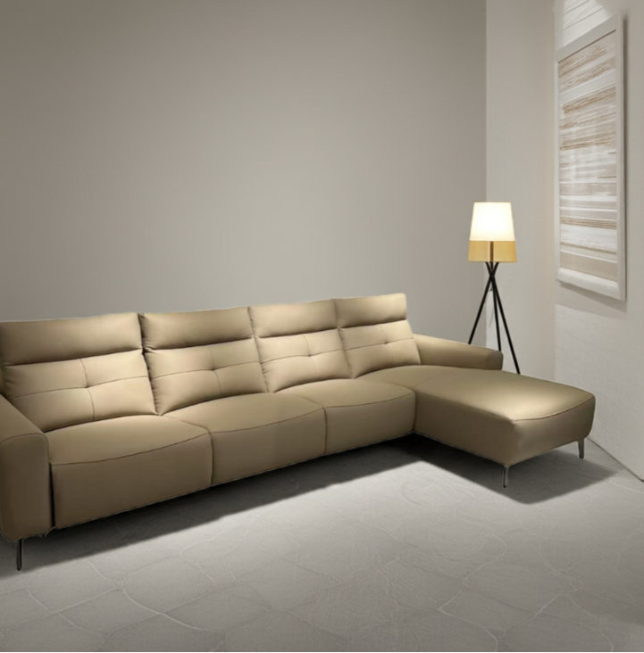 Beige sectional sofa in a modern living room setting with decor elements.
