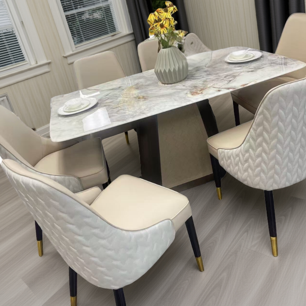 Dining room with marble table and beige chairs