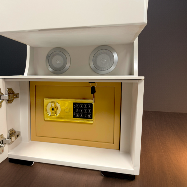 White cabinet with a yellow safe inside, illuminated by a lamp on a wooden floor.