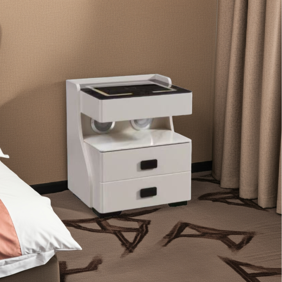 White nightstand with two drawers next to a bed in a bedroom setting.