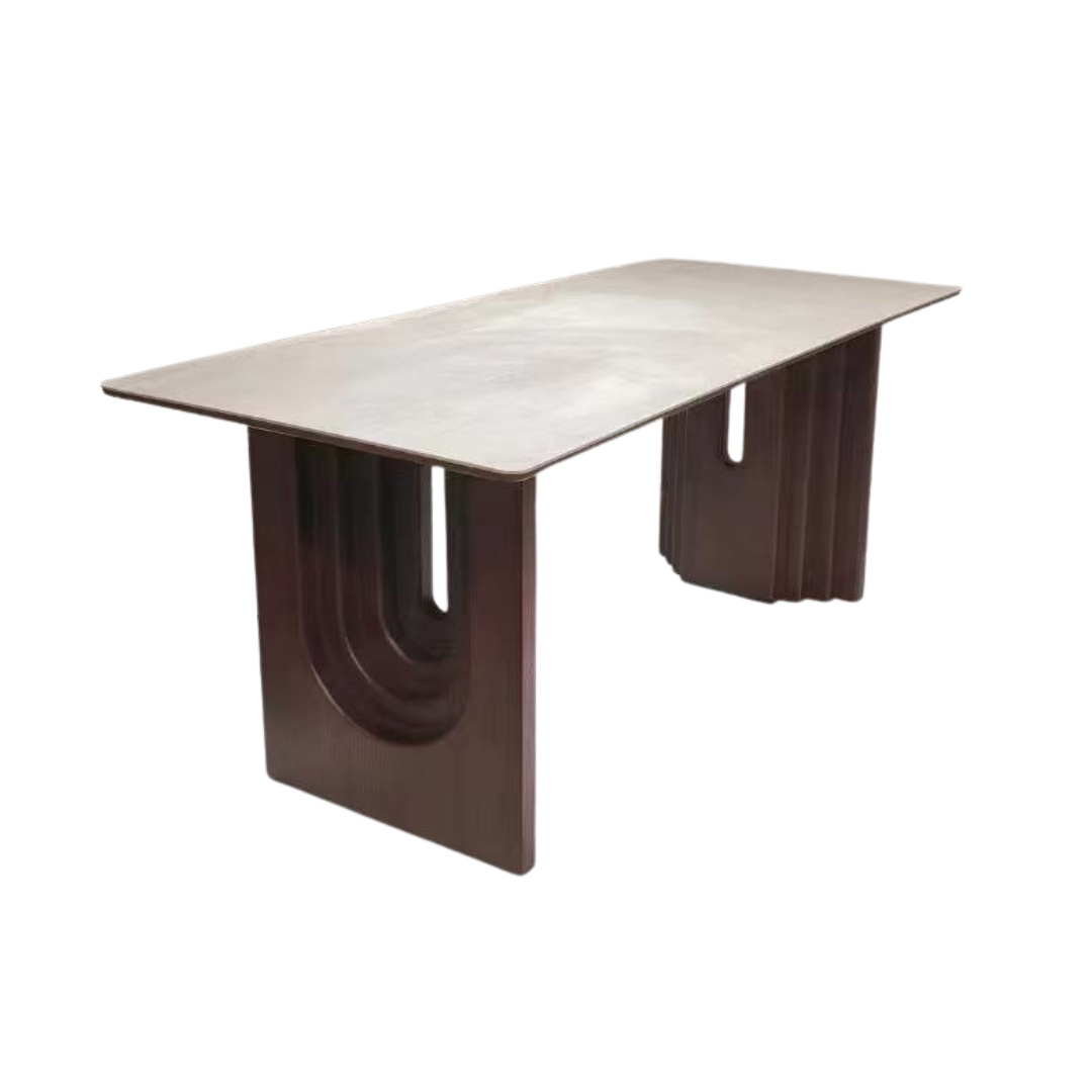 Modern dining table with a marble top and wooden base on a white background
