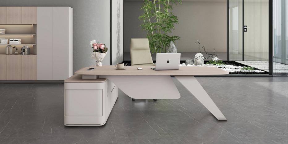 Modern office desk with a laptop, plants, and decor in a stylish office setting.