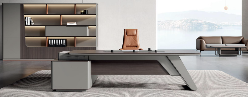 Modern office setup with a large desk, chair, and bookshelf in a bright room.