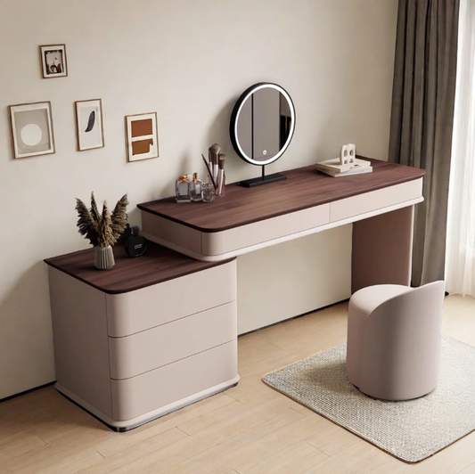 Modern vanity table with mirror and decorative items in a room setting.