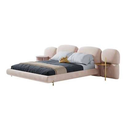 Modern bed with beige headboard and side tables on a white background