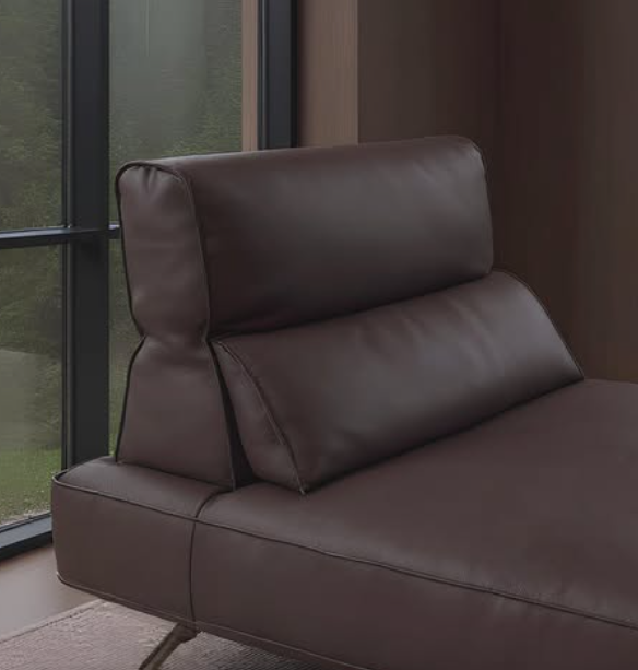 Brown leather armchair in a room with large windows genesis furniture