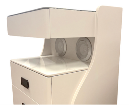 Beige electronic device with two circular components on a white background
