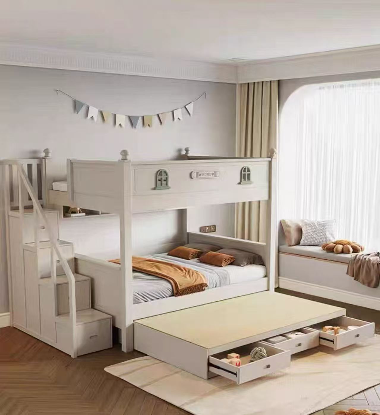 White bunk bed with pull-out trundle in a bedroom setting.