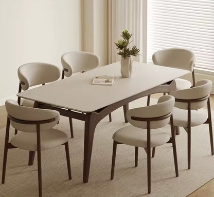 Dining table set with chairs in a modern room