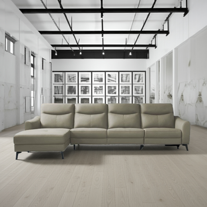 Beige sectional sofa in a modern room with white walls and wooden floor.