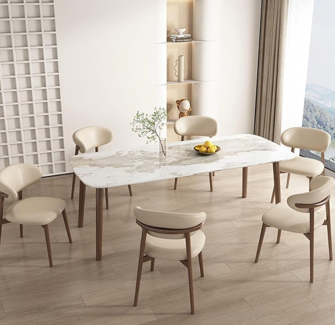Dining room with marble table and beige chairs in a modern interior setting.