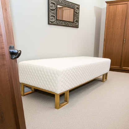 White mattress on a wooden bed frame in a room with a wooden wardrobe and mirror.