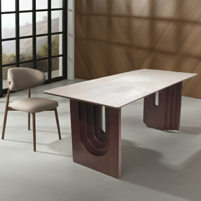Modern dining table with unique design in a room with large windows and wooden wall.